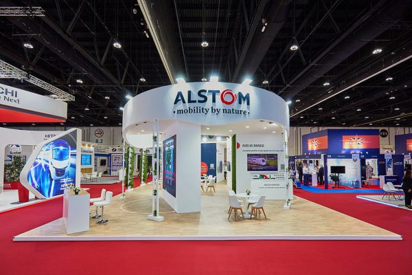 A circular design custom stand for brand ALSTOM made by Strokes Exhibits